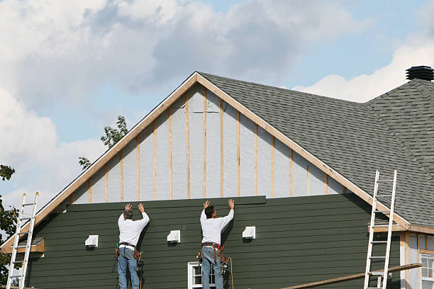 Professional Vinyl Siding technician working in Fayville, MA